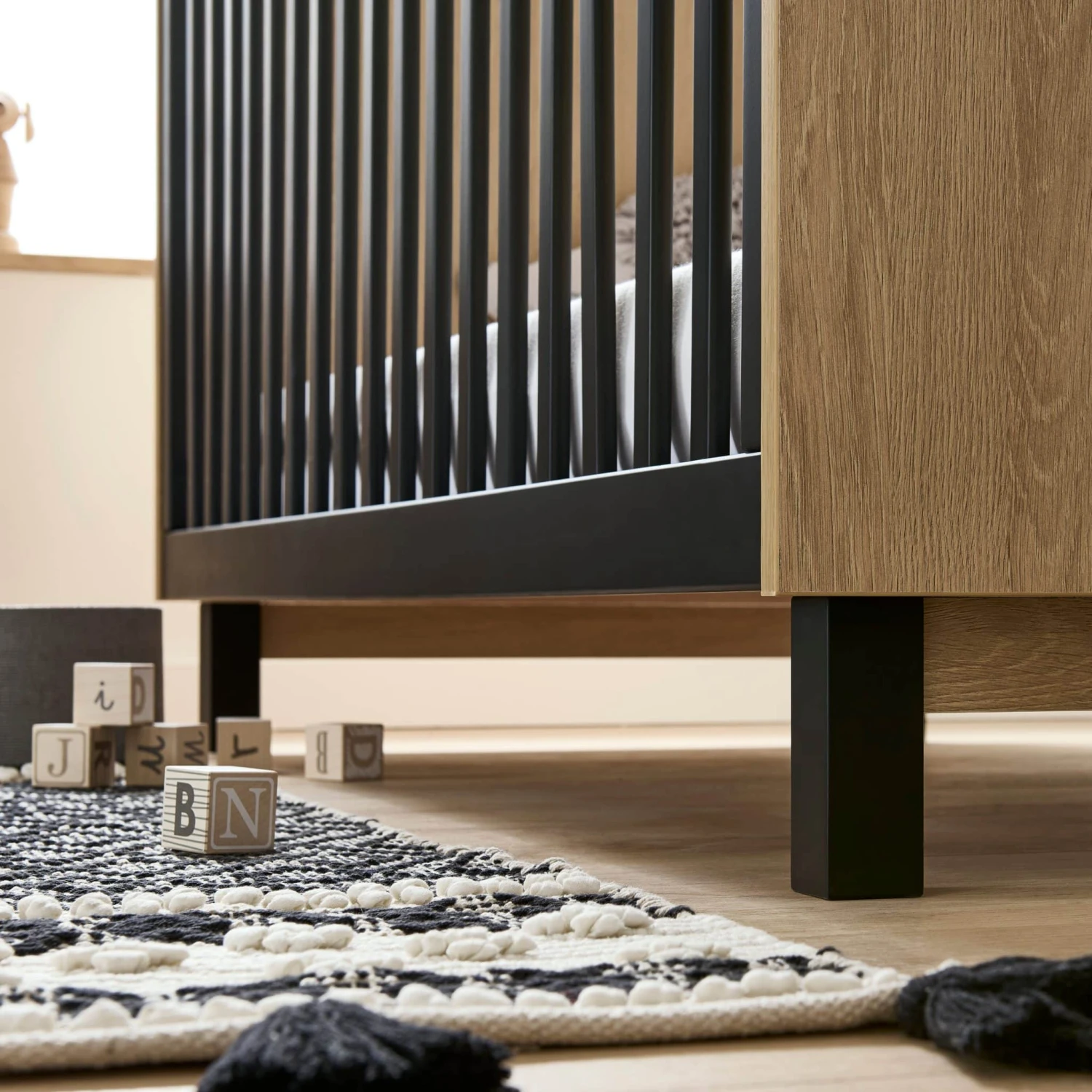 CuddleCo Rafi Cot Bed – Oak And Black 4 CuddleCo Rafi Cot Bed – Oak And Black - Image 2